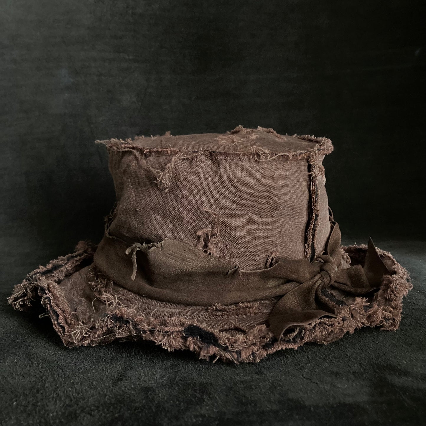 Frayed brown linen damage bucket hat