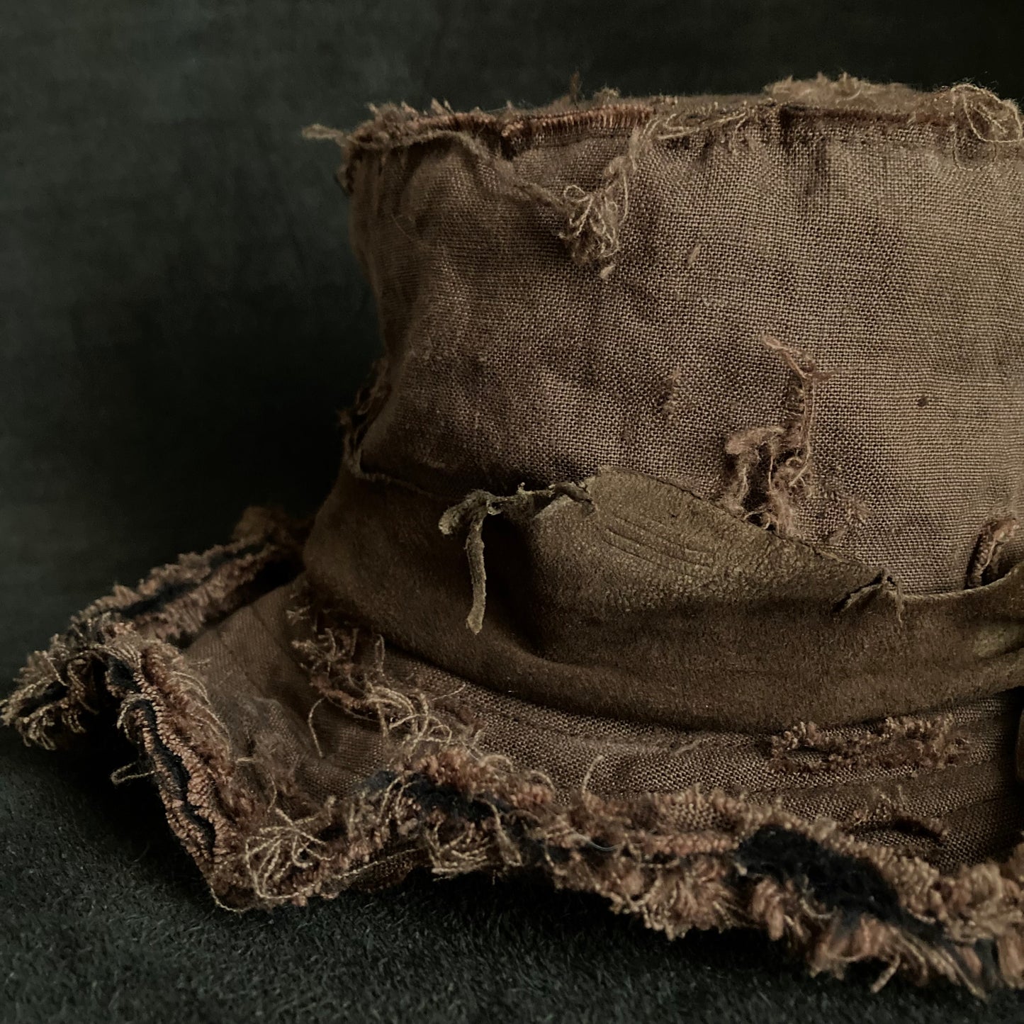 Frayed brown linen damage bucket hat