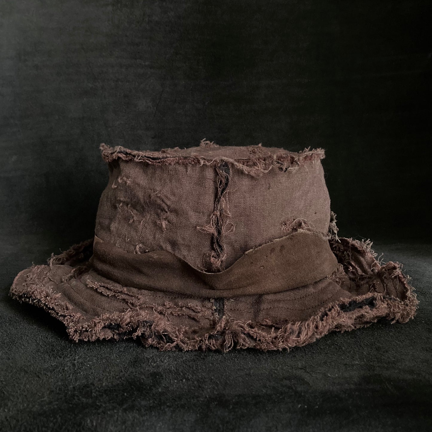 Frayed brown linen damage bucket hat
