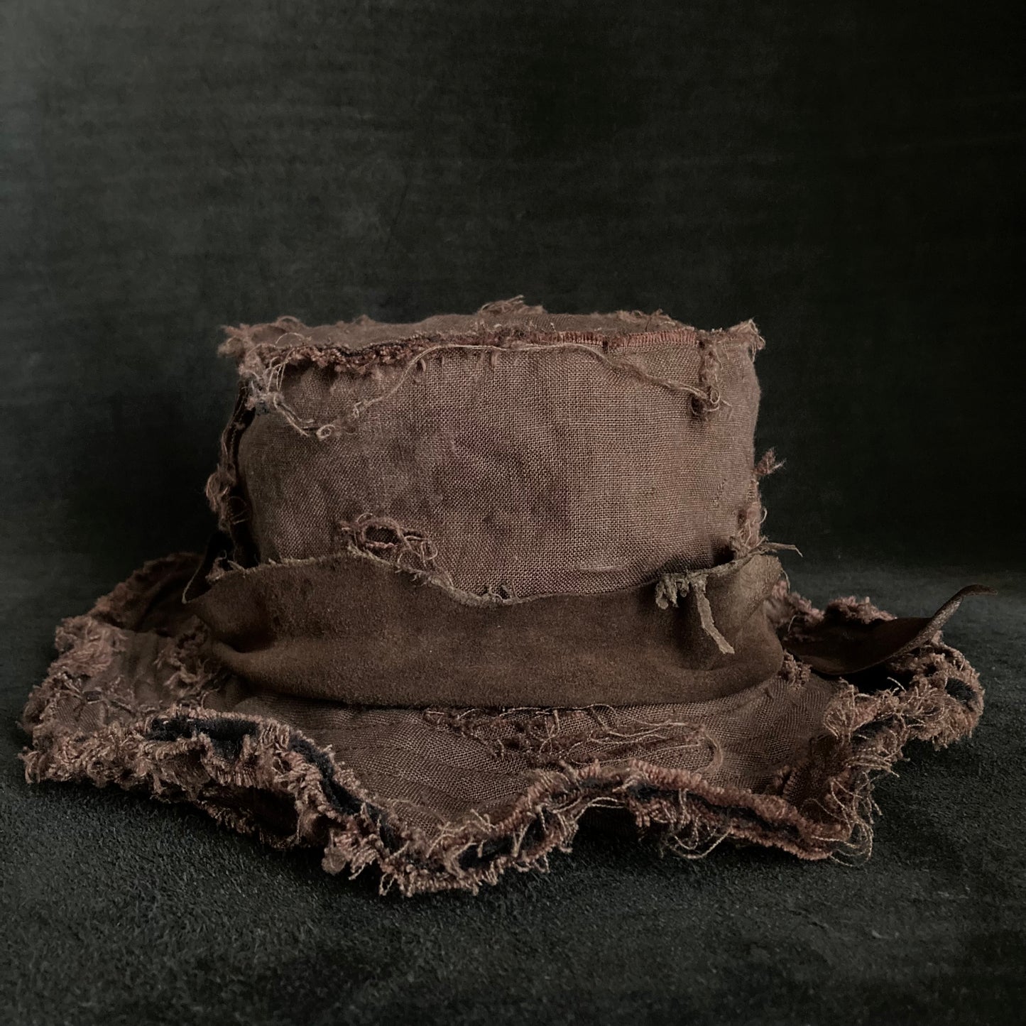 Frayed brown linen damage bucket hat