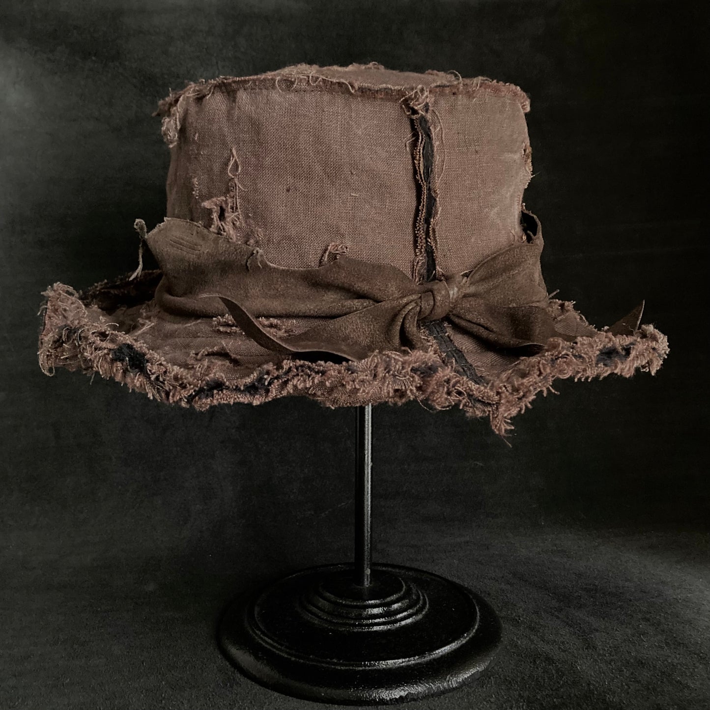 Frayed brown linen damage bucket hat