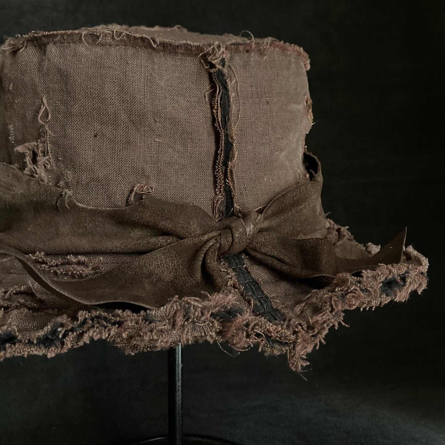 Frayed brown linen damage bucket hat