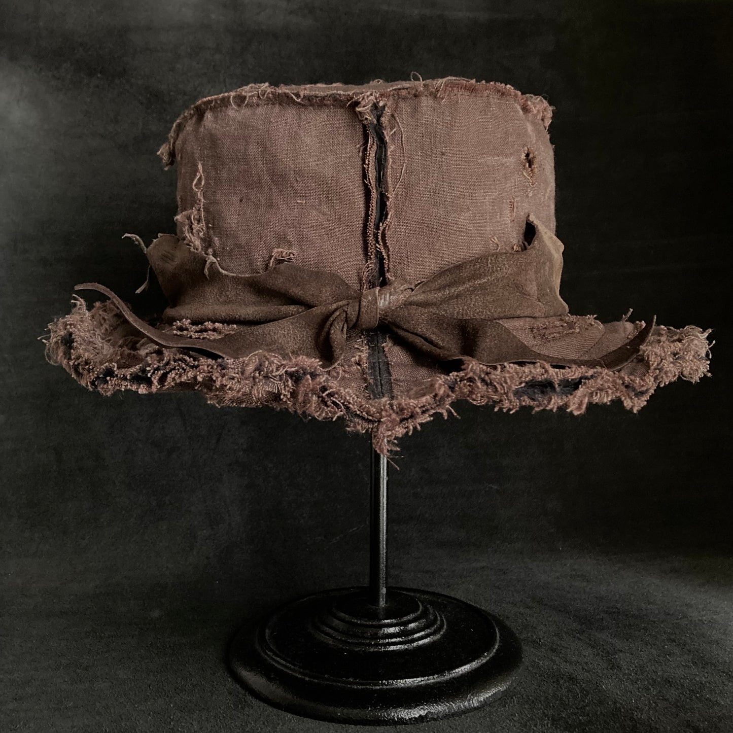 Frayed brown linen damage bucket hat