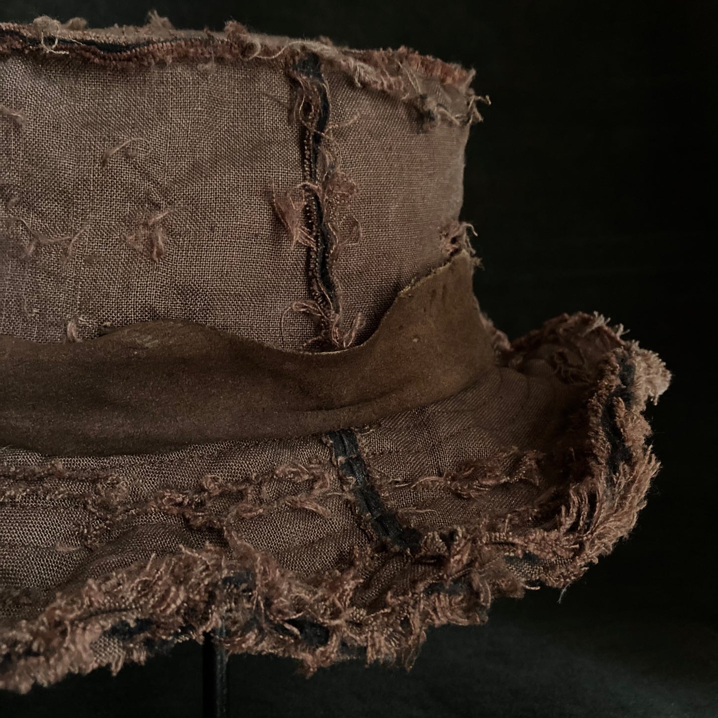 Frayed brown linen damage bucket hat