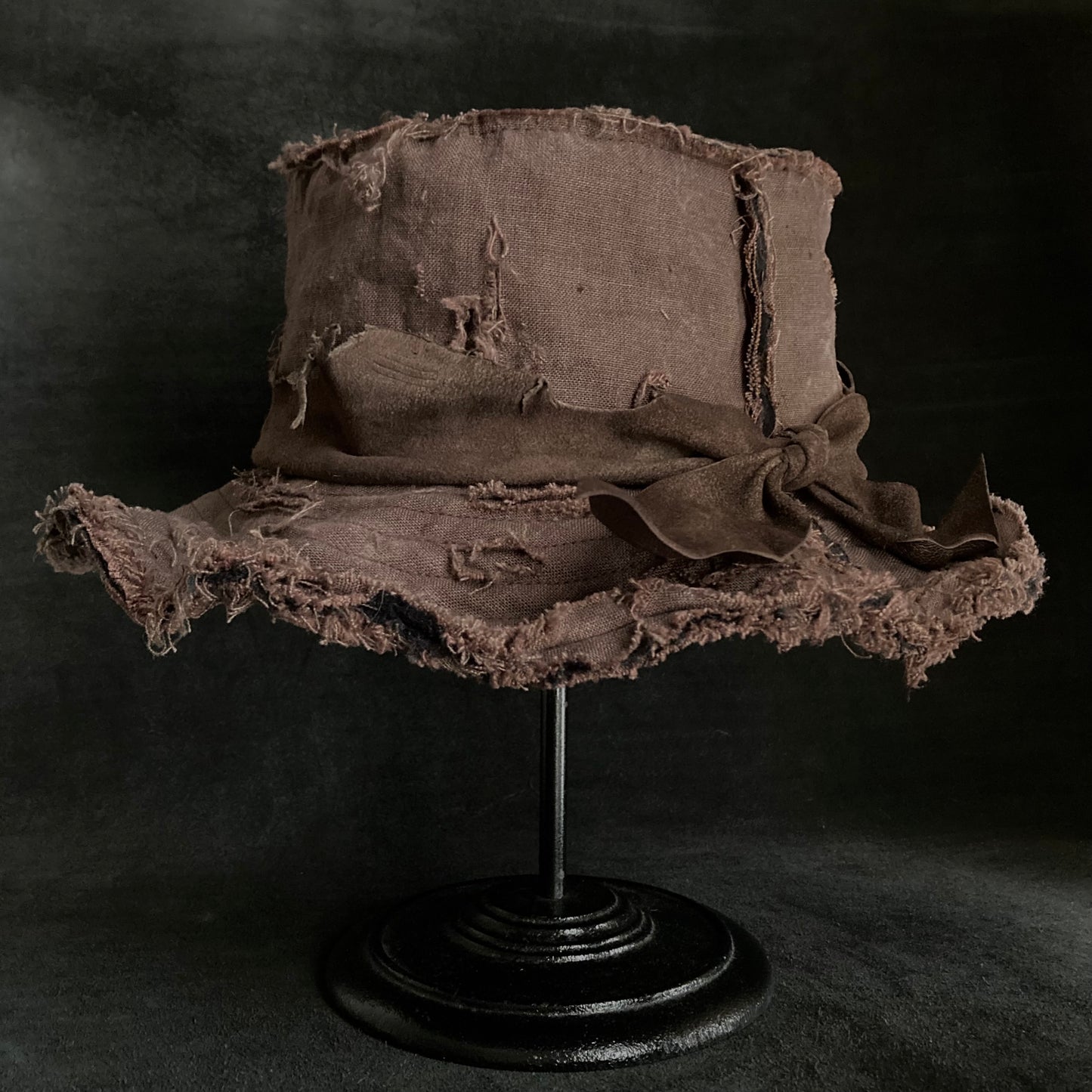 Frayed brown linen damage bucket hat
