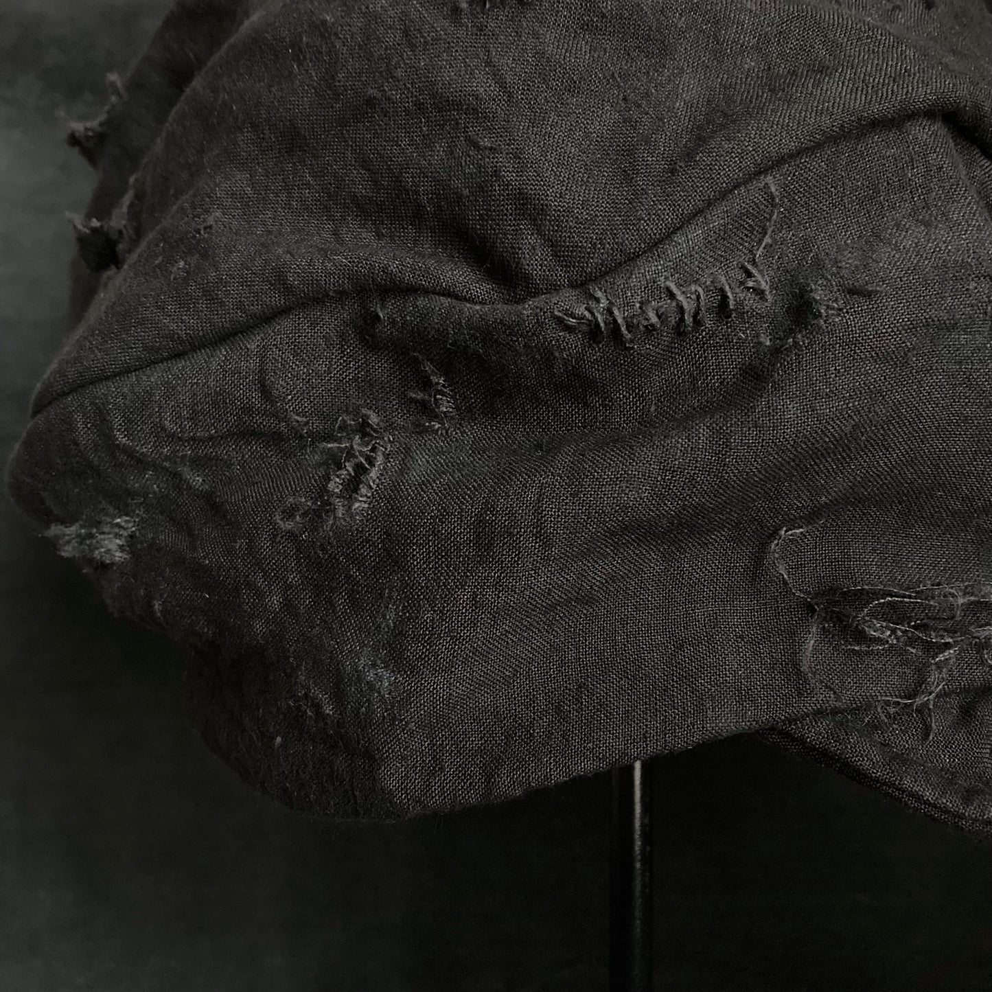 Thin black linen tattered turn cap