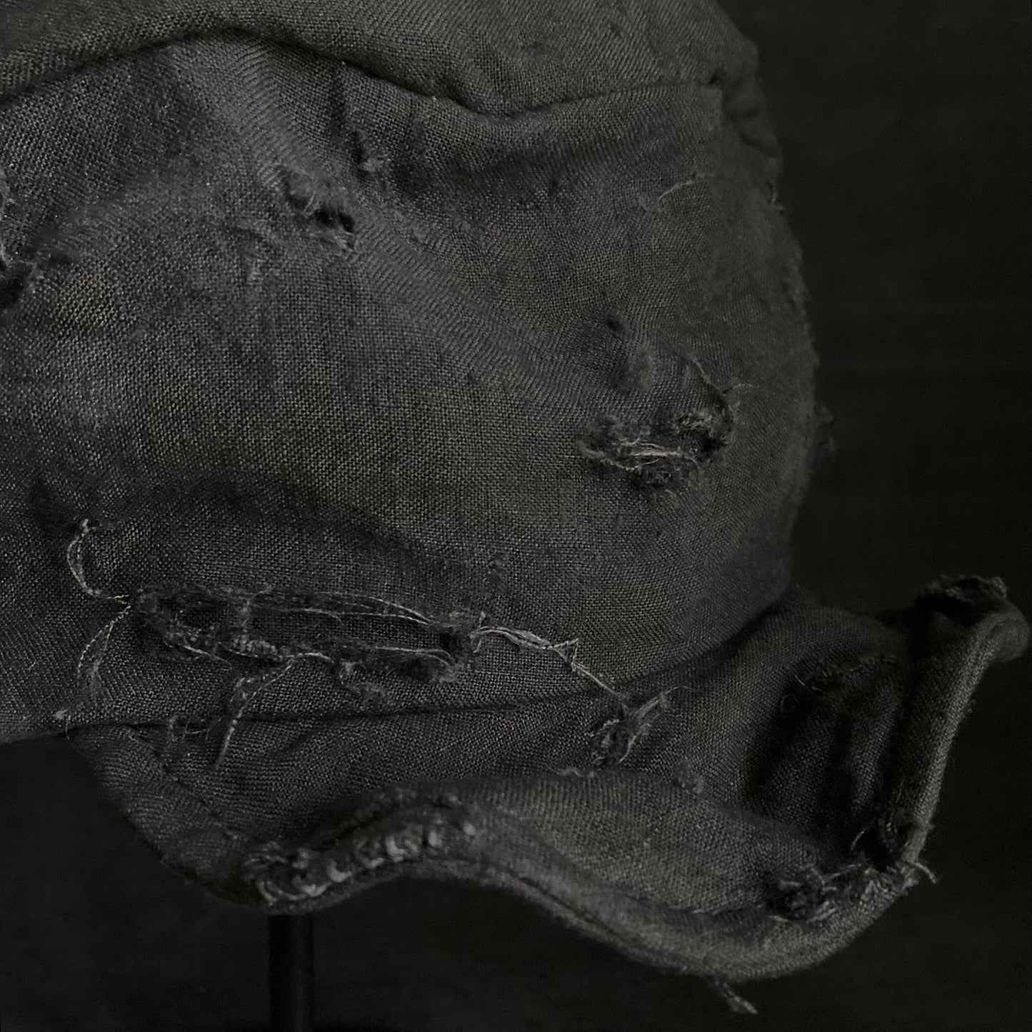 Thin black linen tattered turn cap