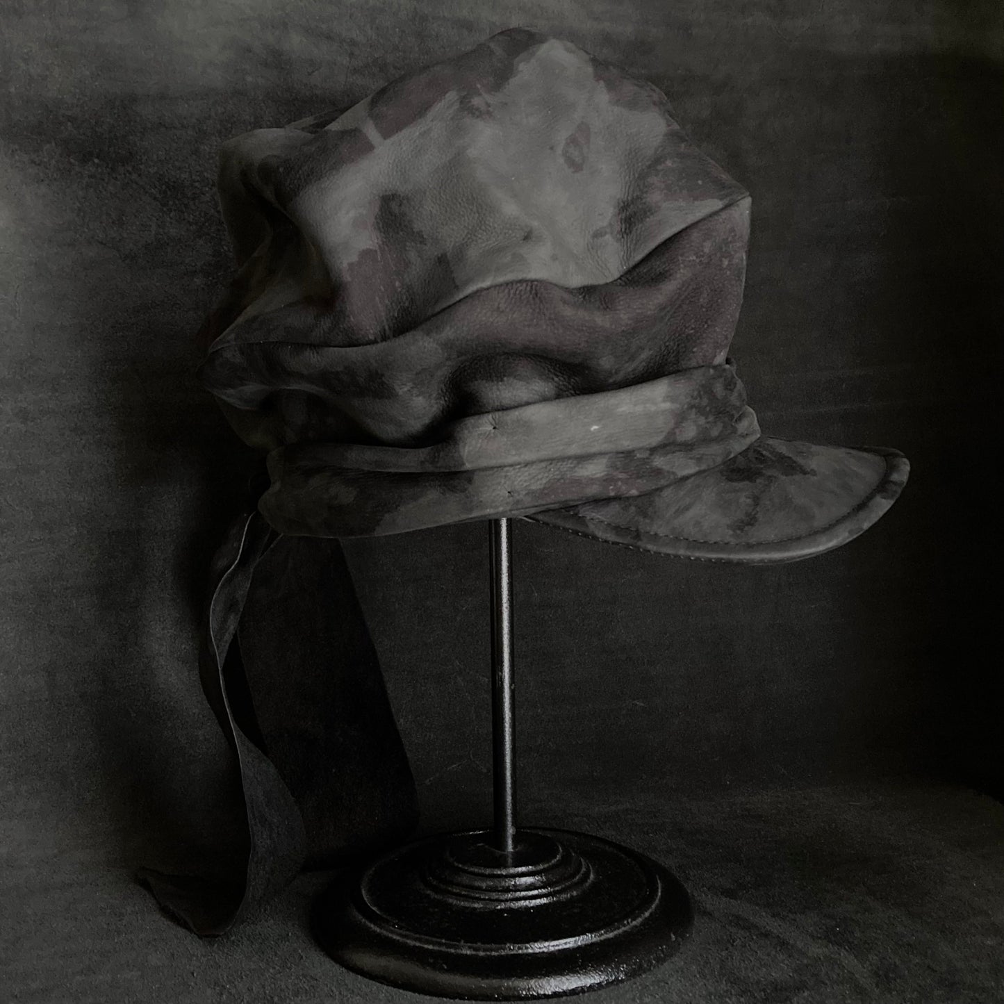 Bleaching black leather martial turn cap