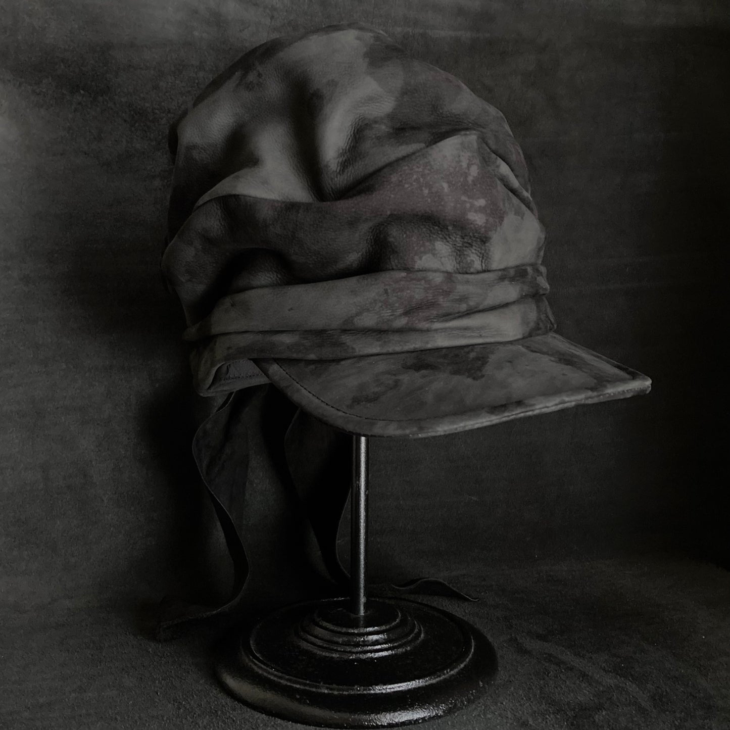 Bleaching black leather martial turn cap
