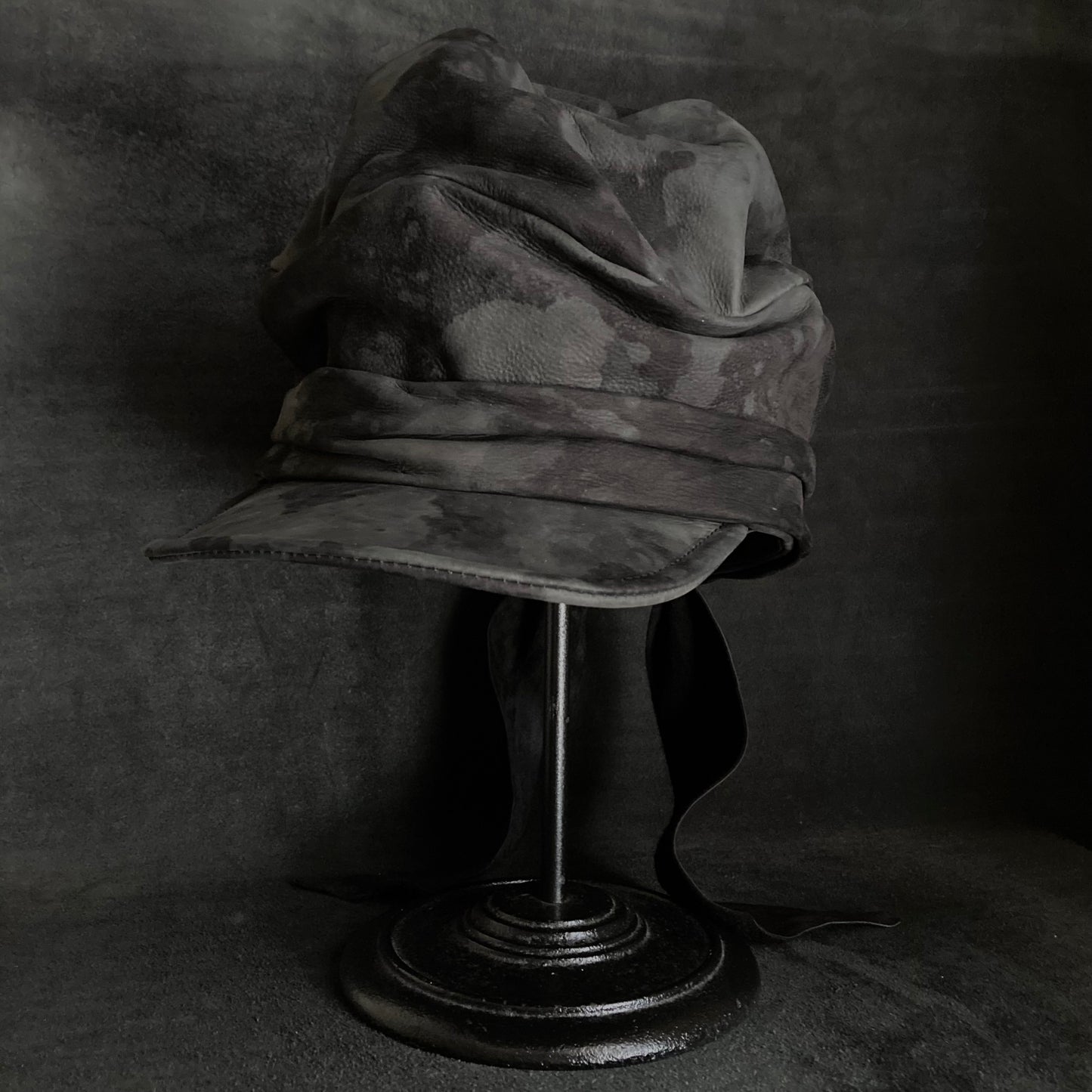 Bleaching black leather martial turn cap