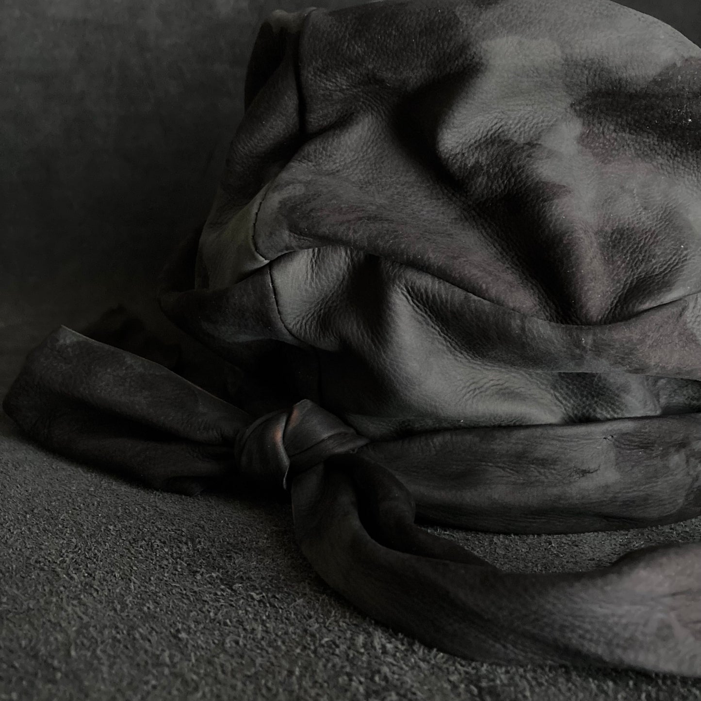 Bleaching black leather martial turn cap