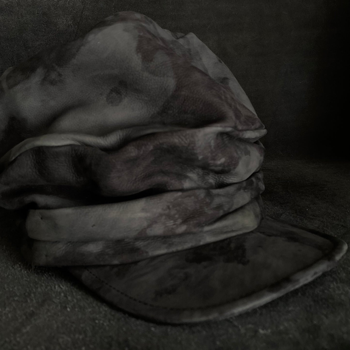 Bleaching black leather martial turn cap
