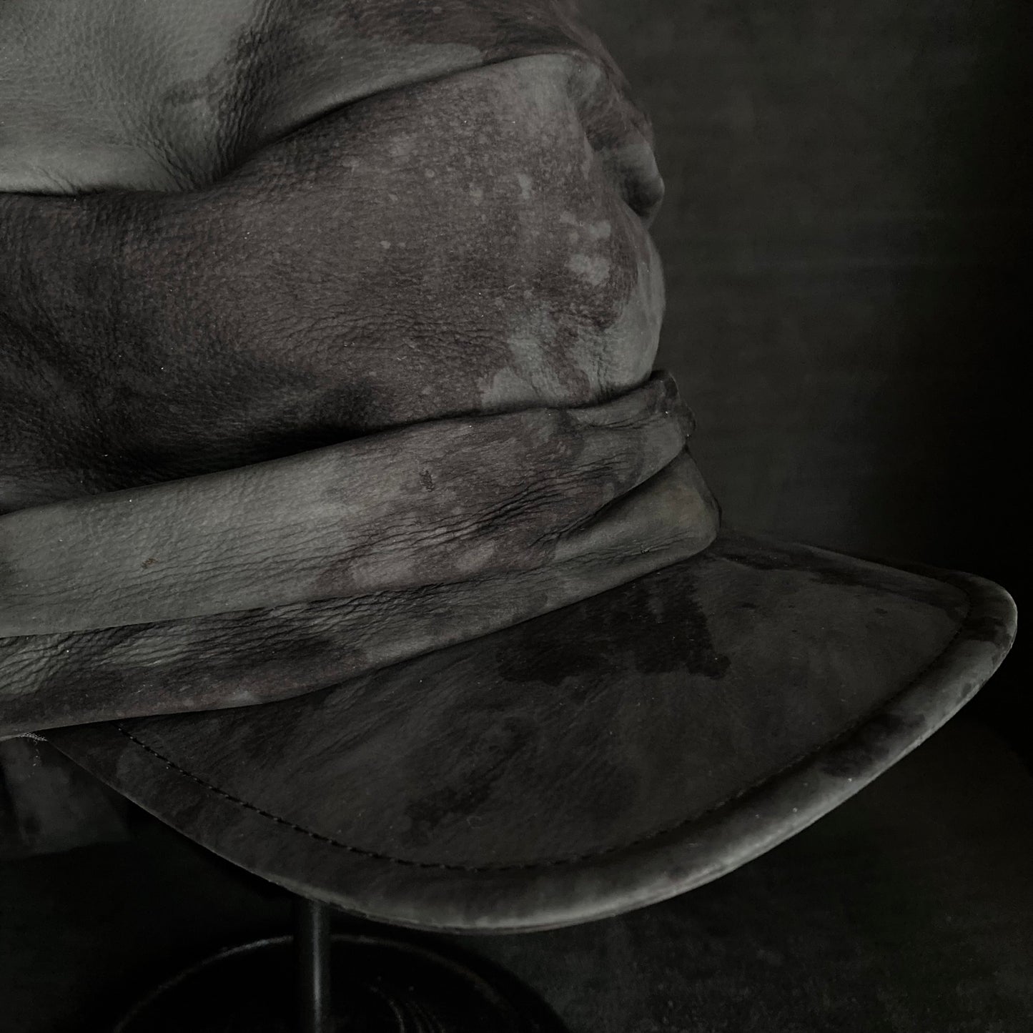 Bleaching black leather martial turn cap
