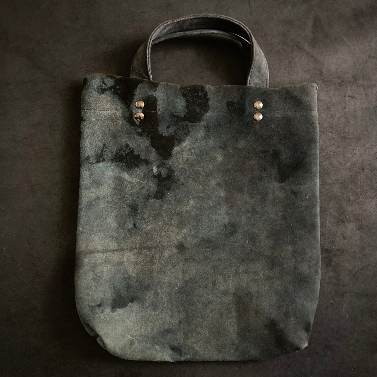 Bleached pale blue black leather tote bag