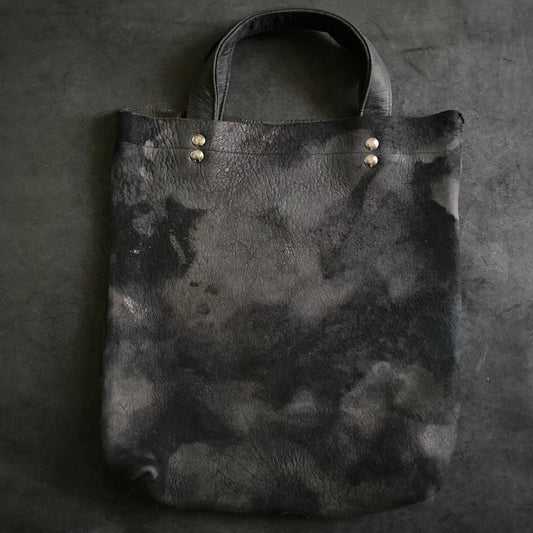 Bleached black leather tote bag