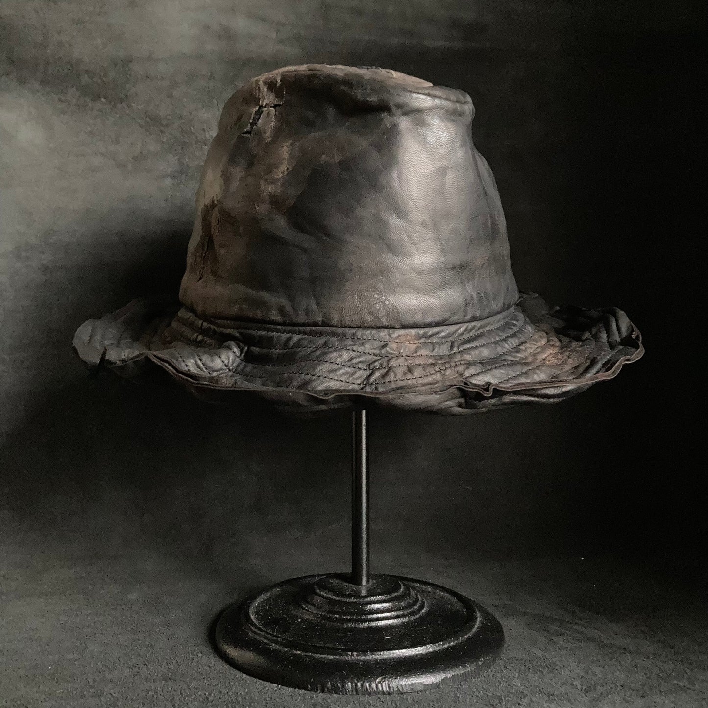 Cracked black leather fedora hat