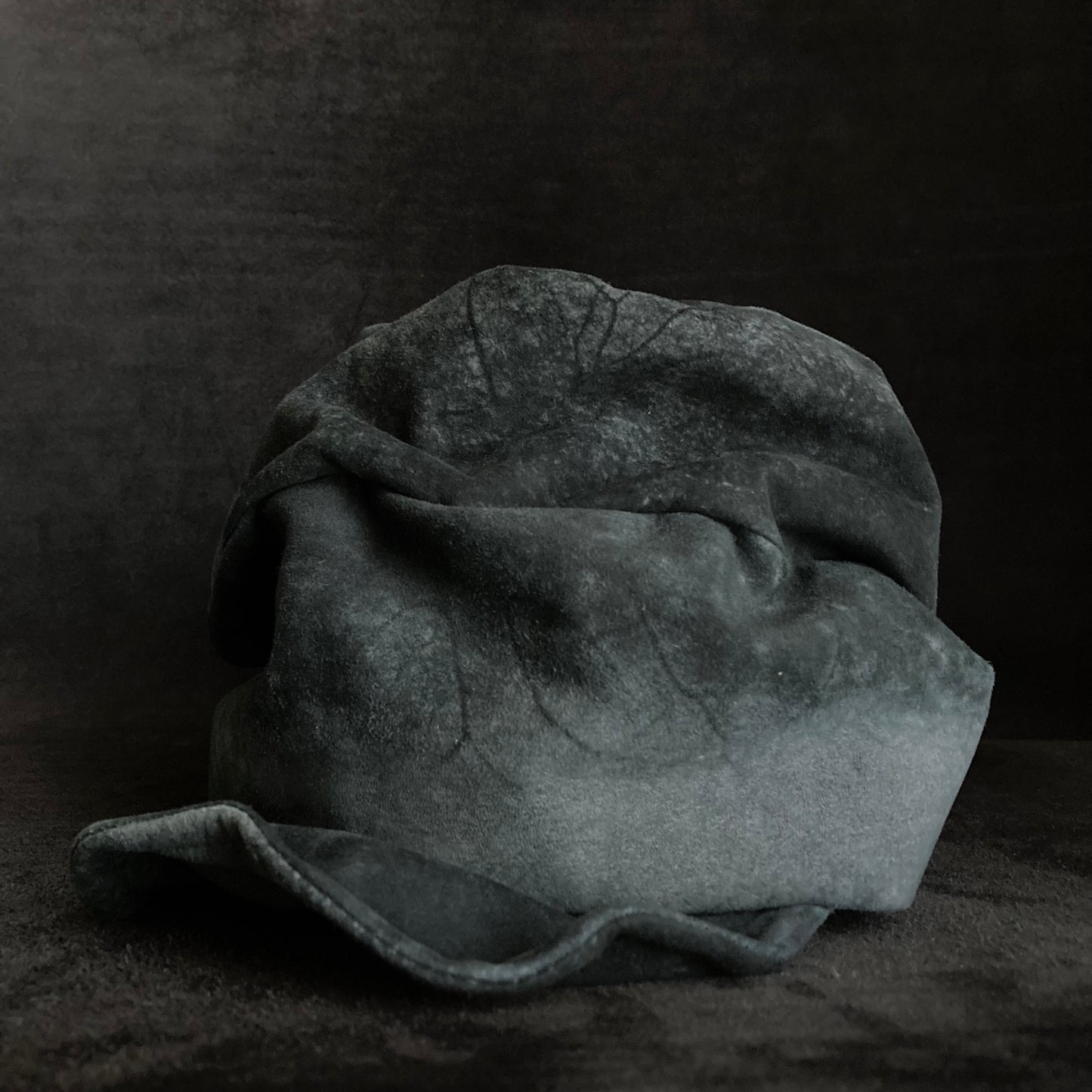 Gray lake leather turn cap