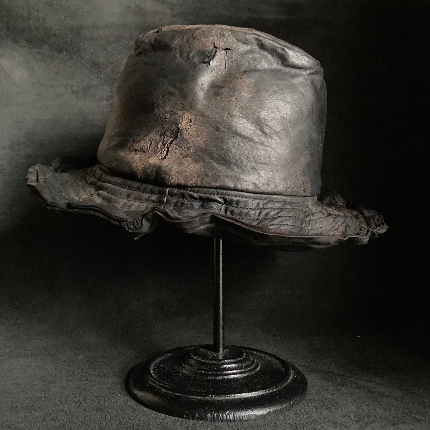 Cracked black leather fedora hat