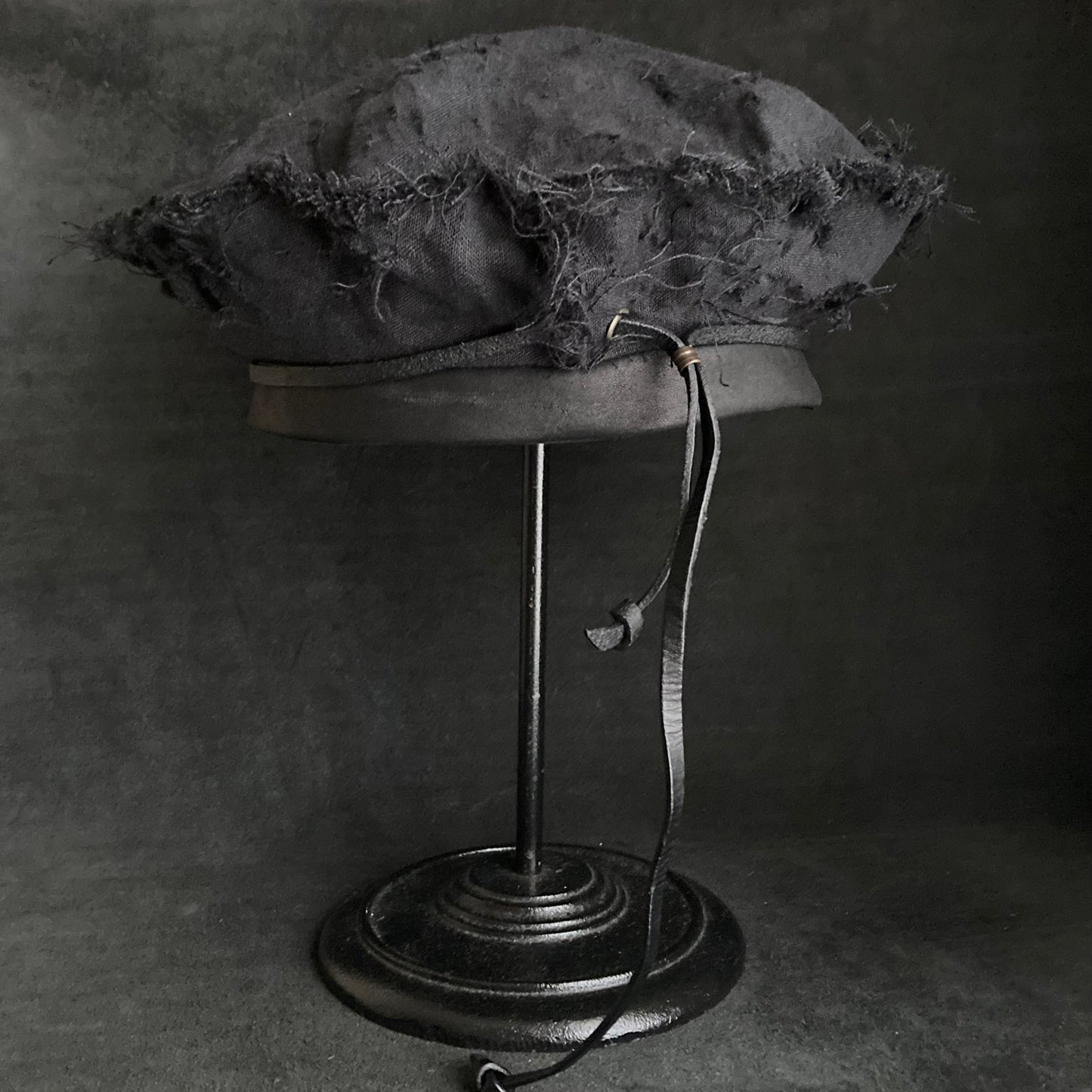 Back side black linen leather strap beret