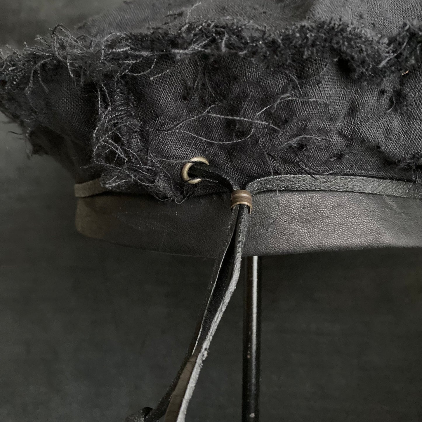 Back side black linen leather strap beret