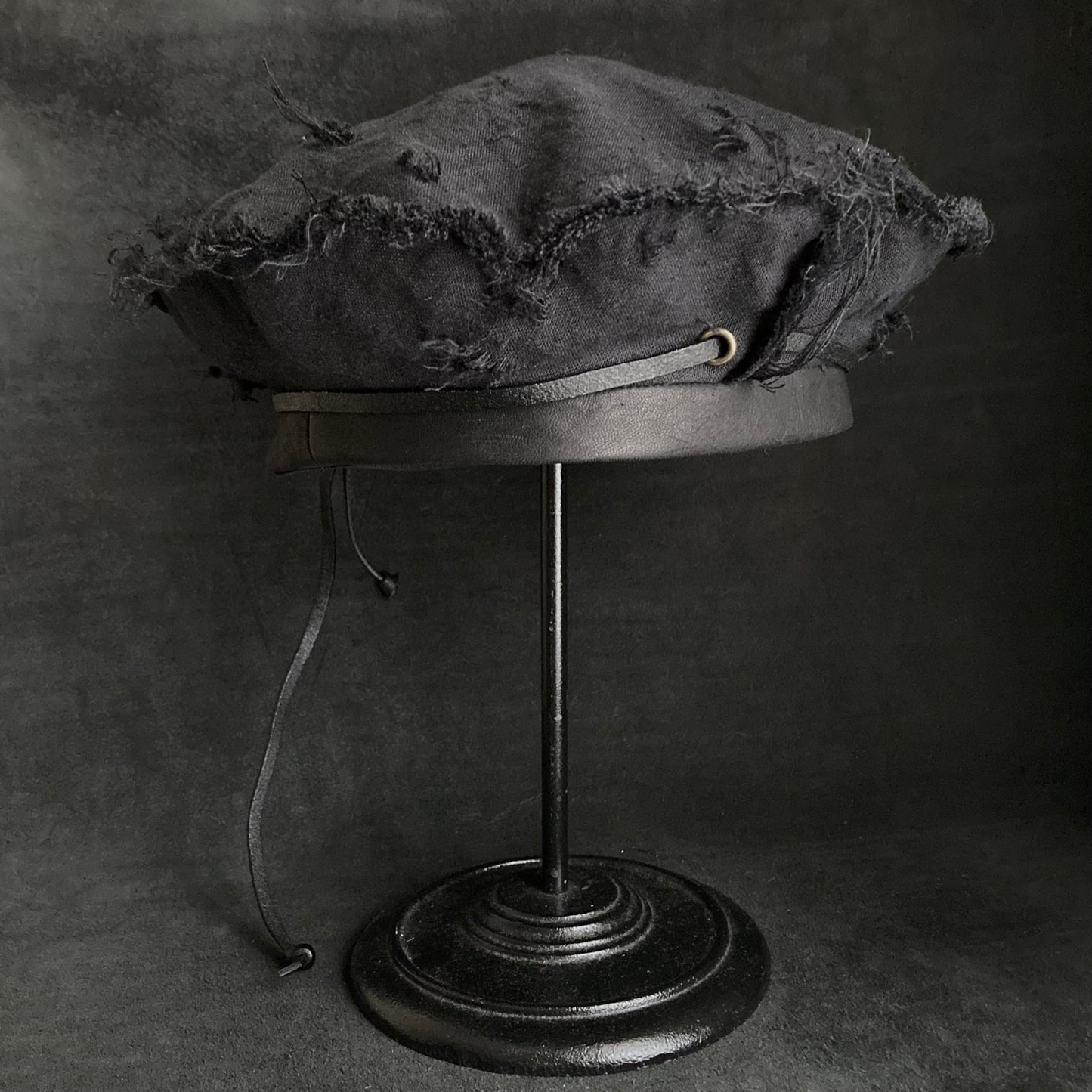 Back side black linen leather strap beret