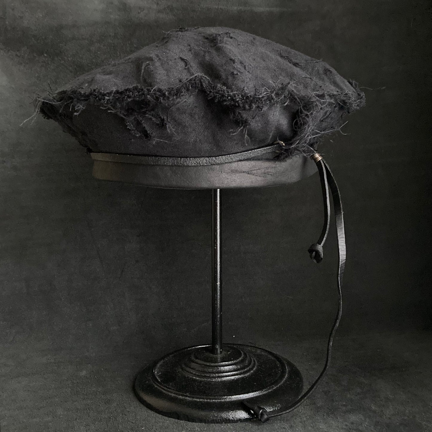 Back side black linen leather strap beret