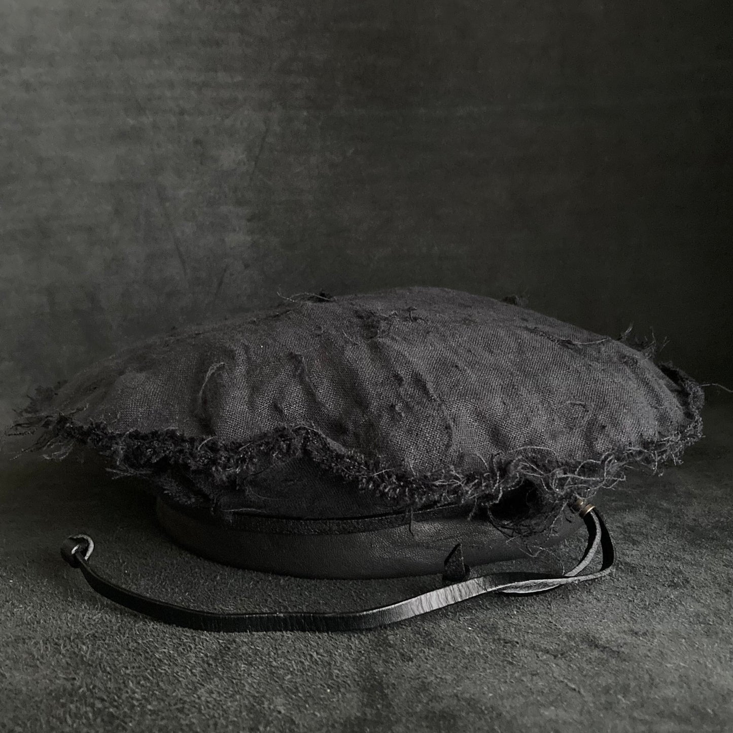 Back side black linen leather strap beret