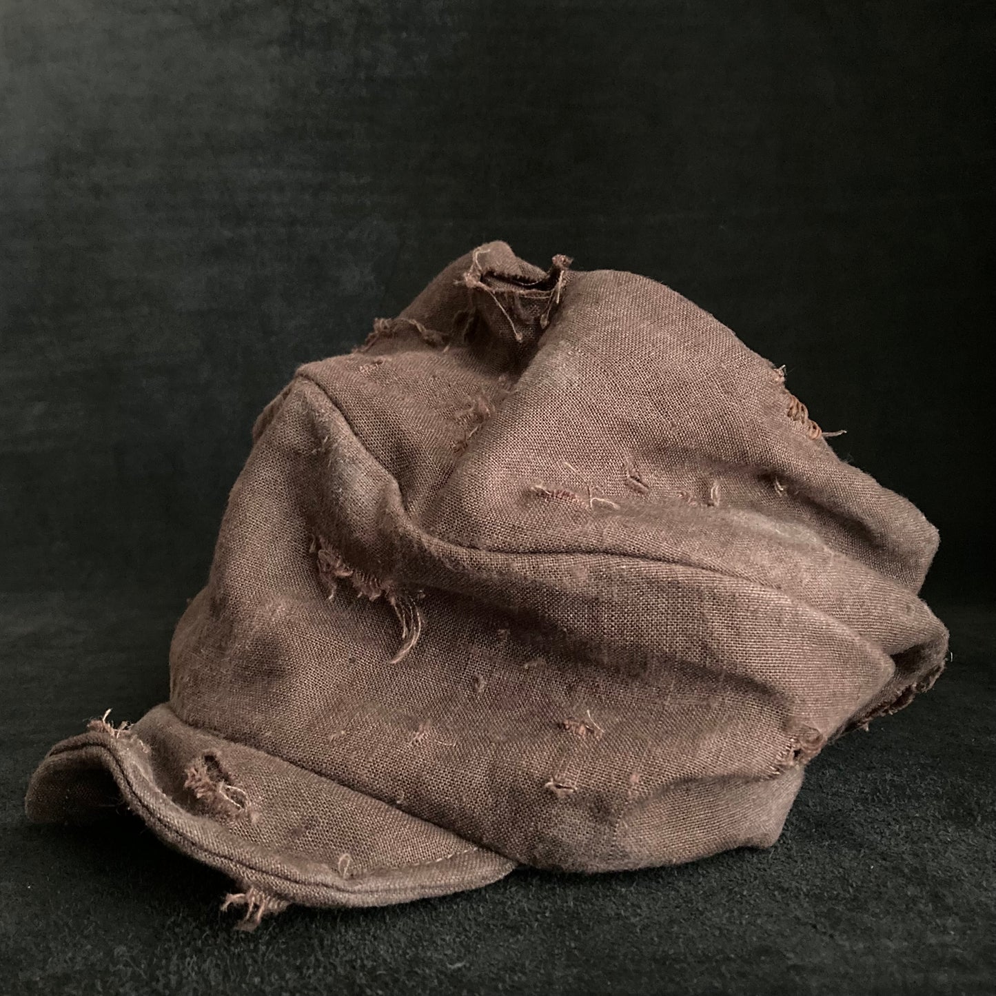 Brown linen damage turn cap