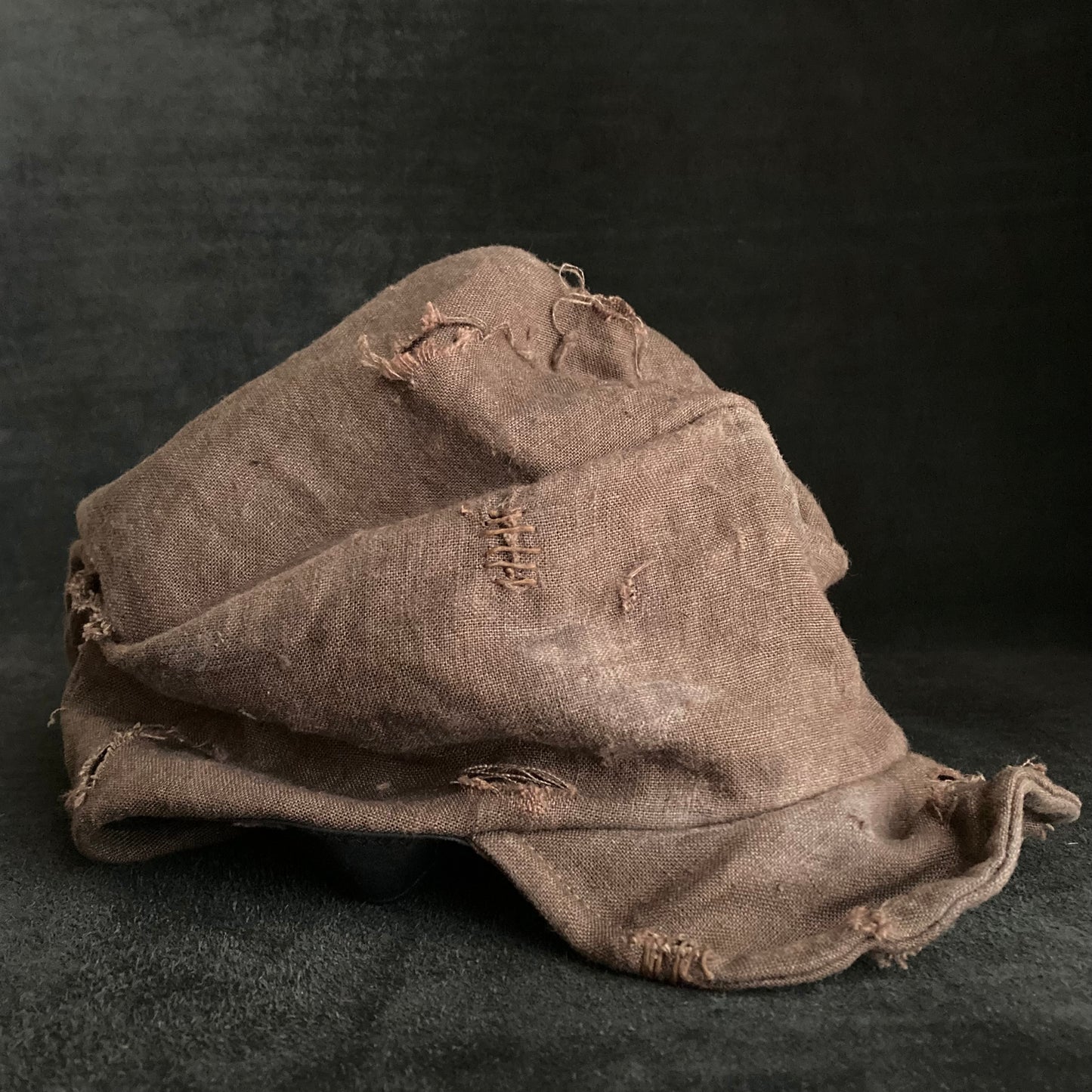 Brown linen damage turn cap
