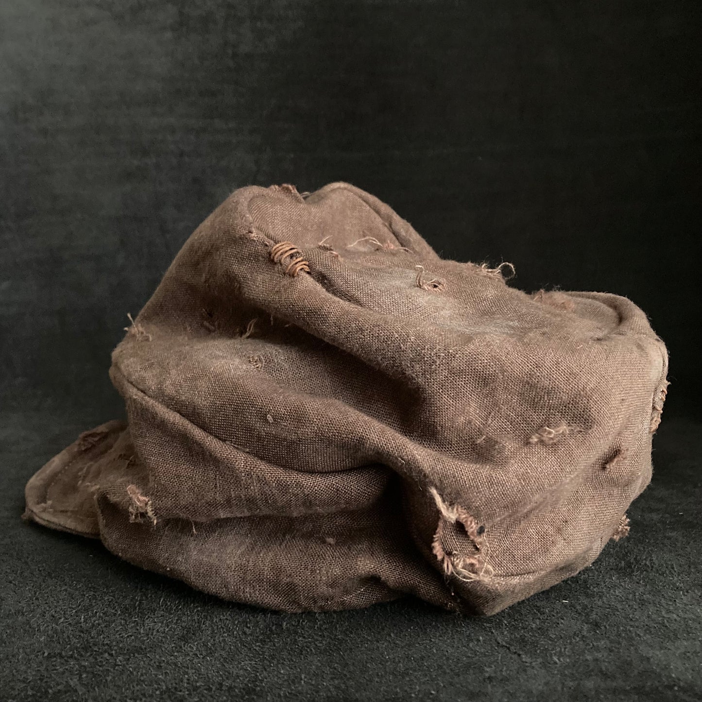 Brown linen damage turn cap