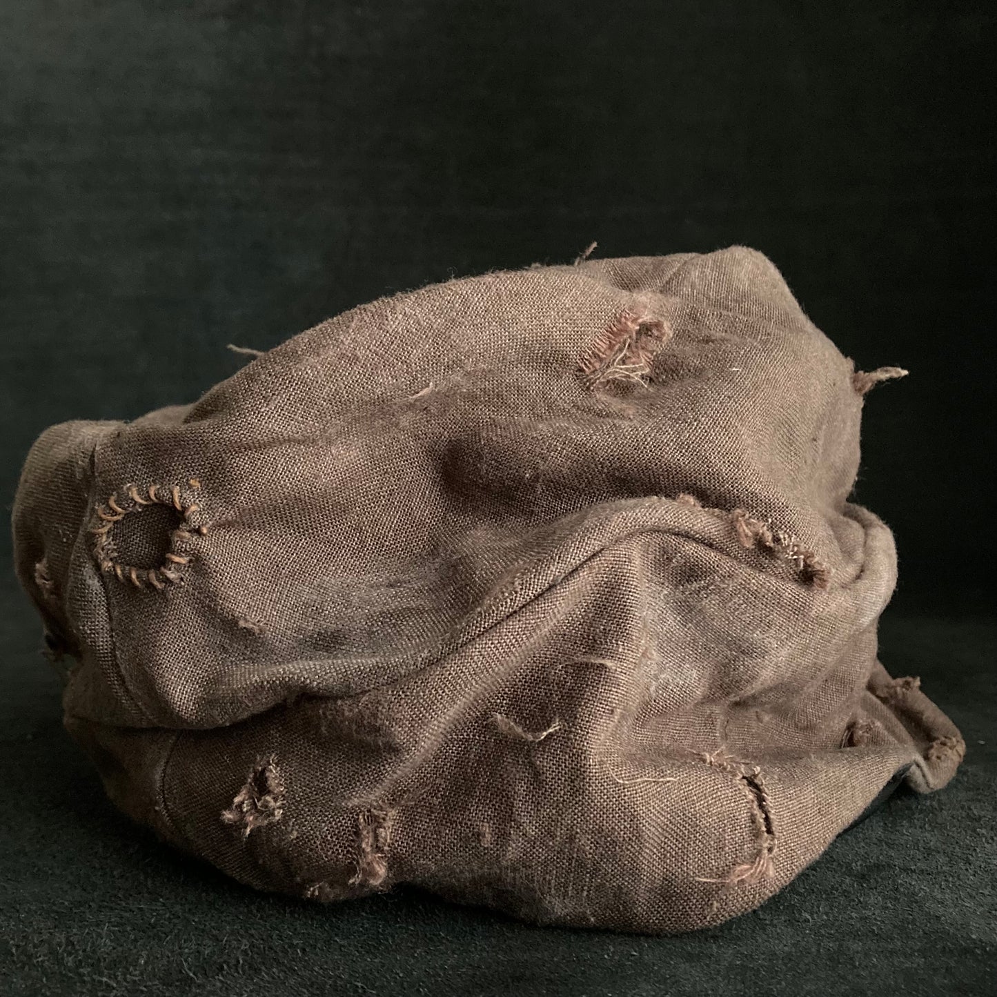 Brown linen damage turn cap