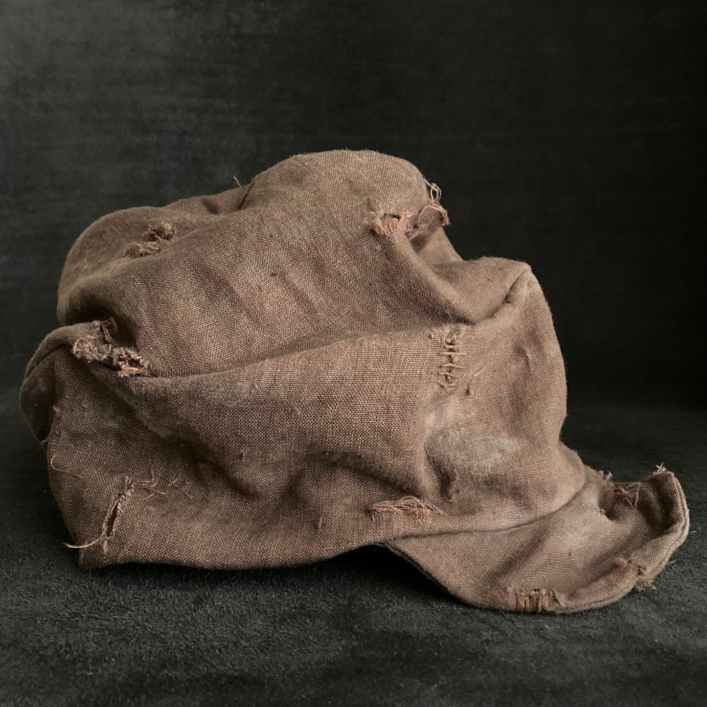 Brown linen damage turn cap