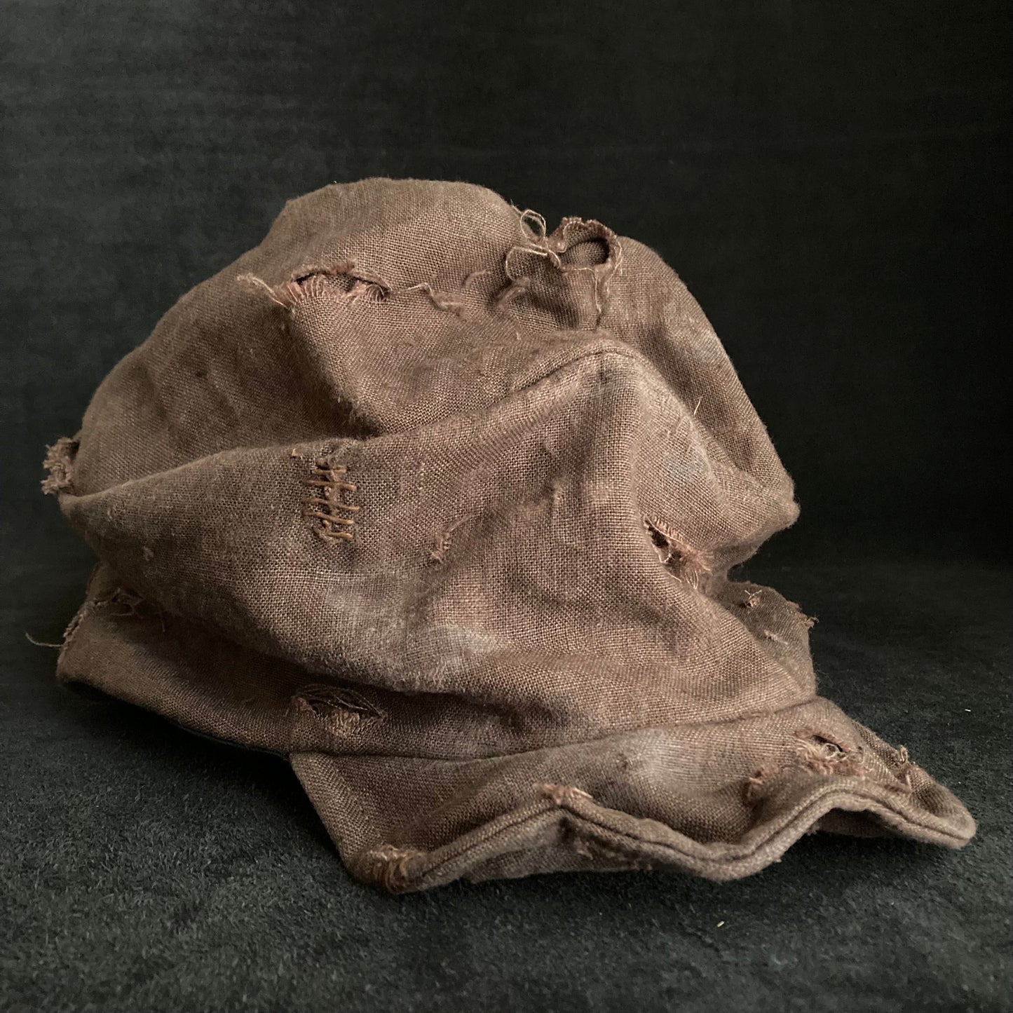 Brown linen damage turn cap