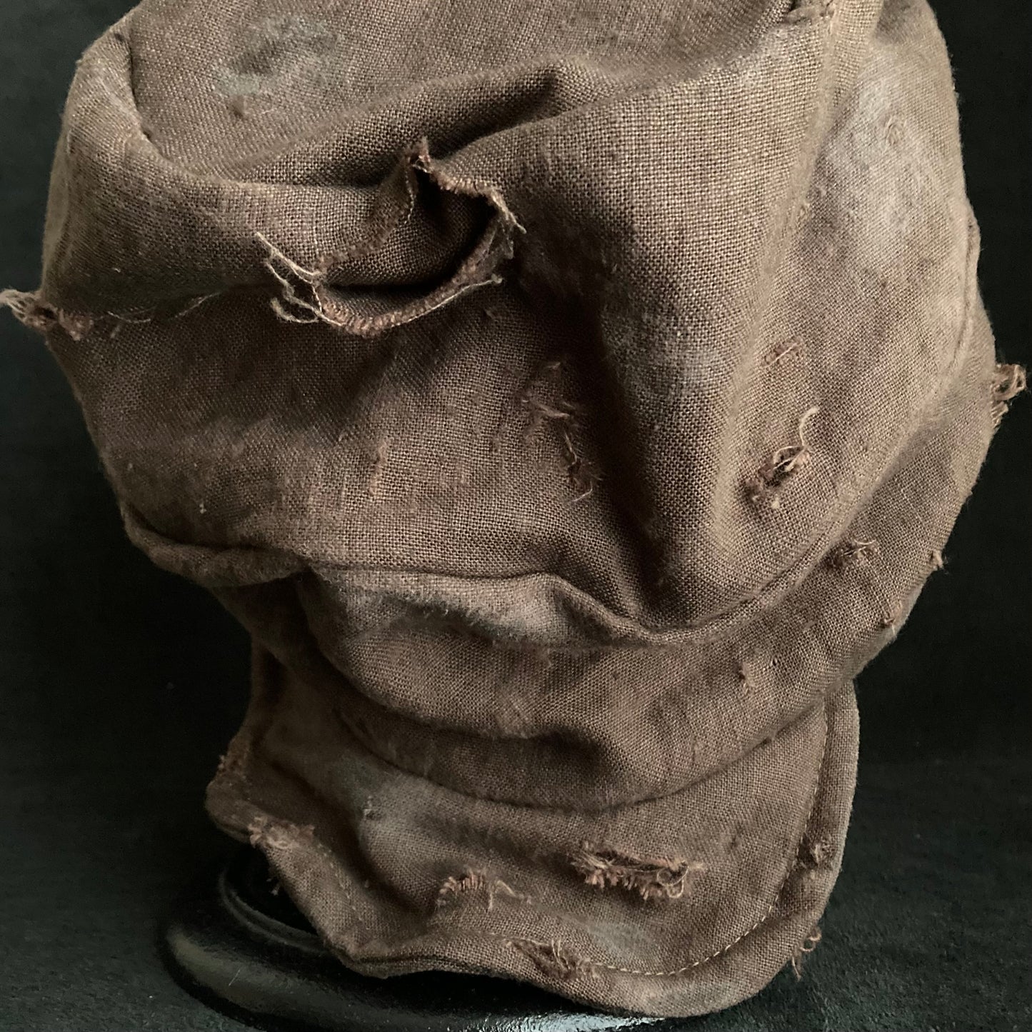 Brown linen damage turn cap