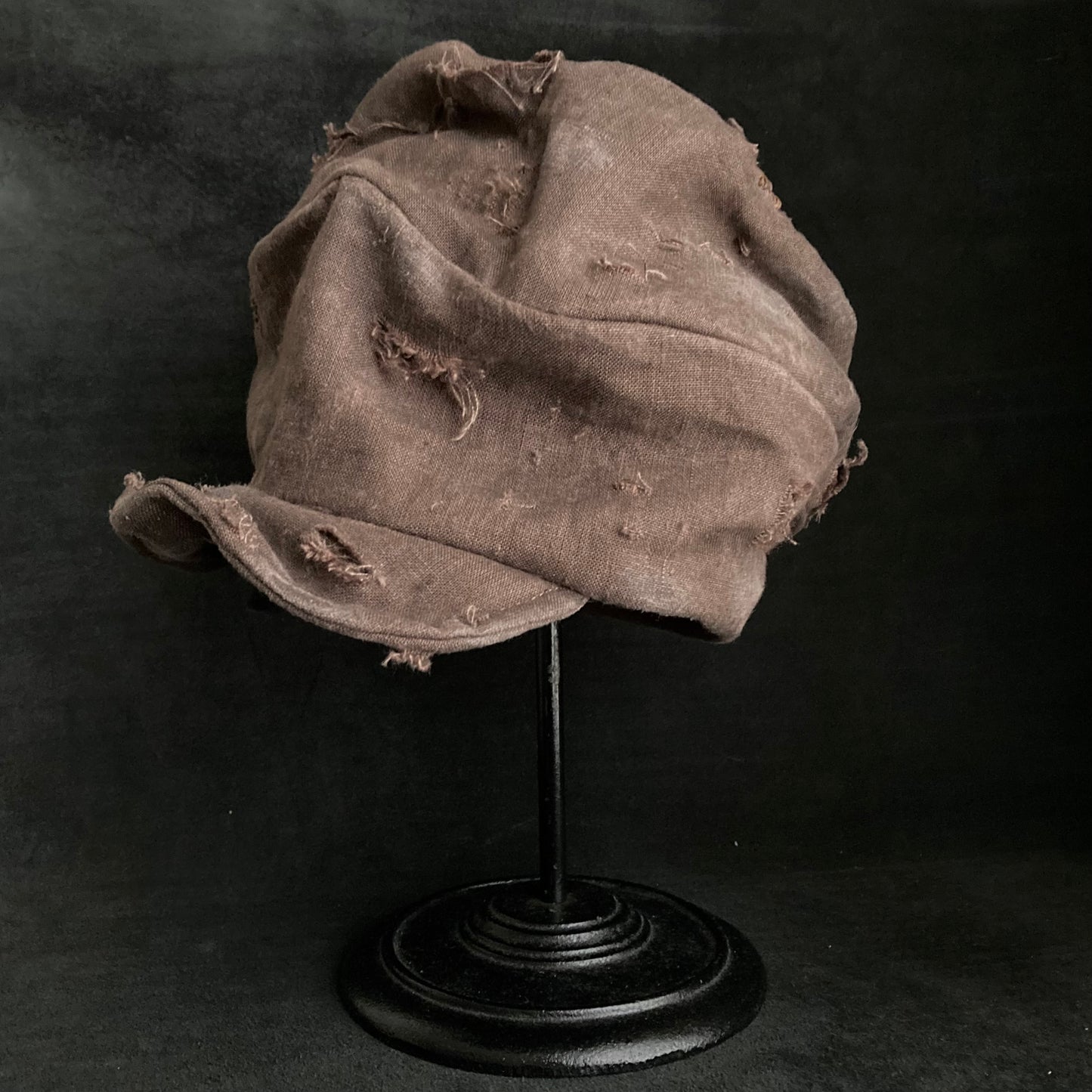 Brown linen damage turn cap