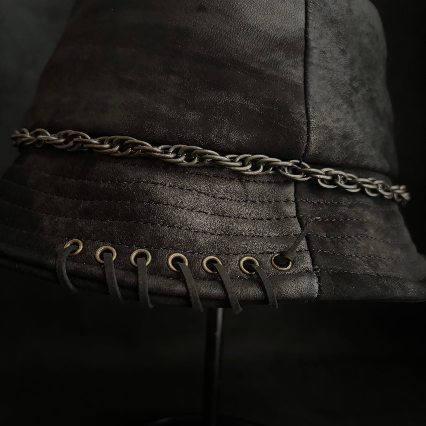 Scraped black leather chain bucket hat