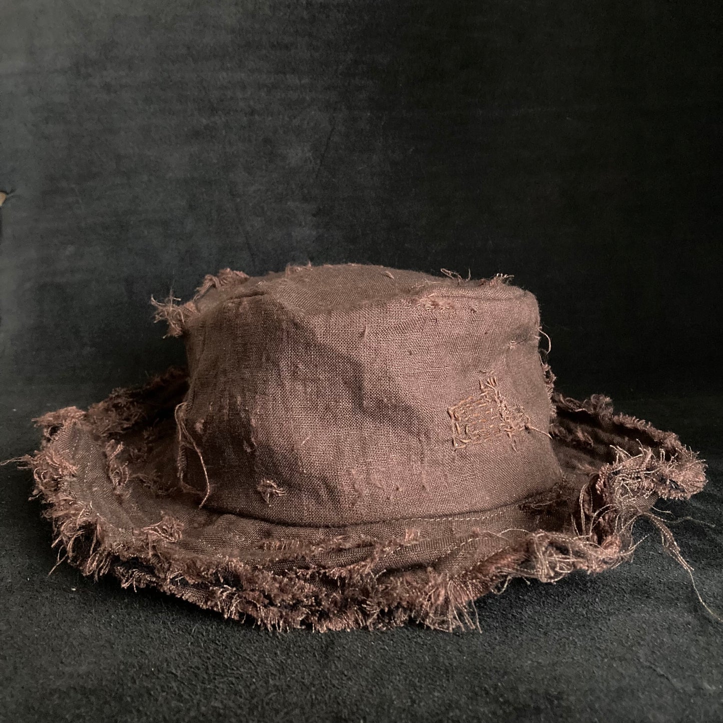 Brown linen damage stitch bucket hat