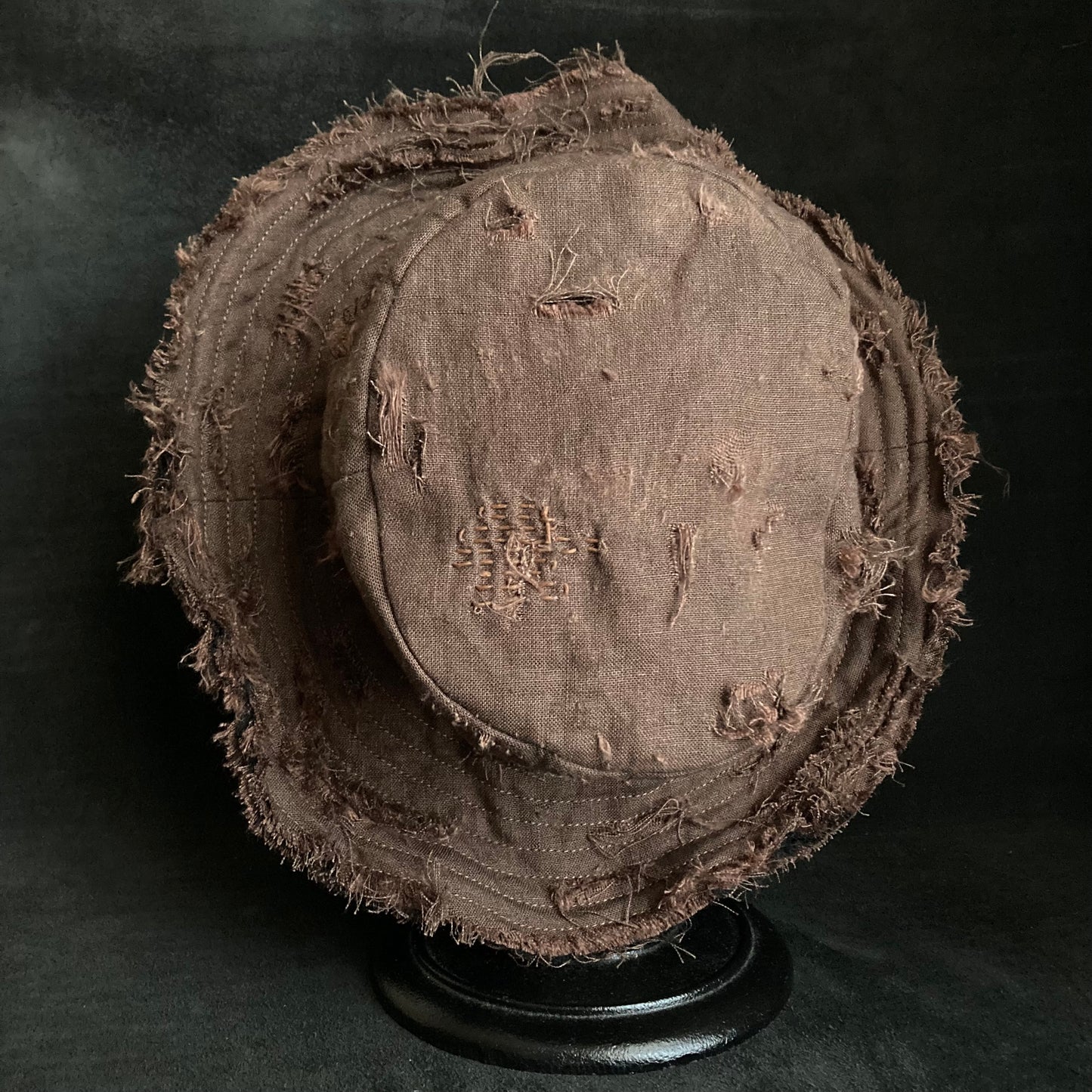 Brown linen damage stitch bucket hat
