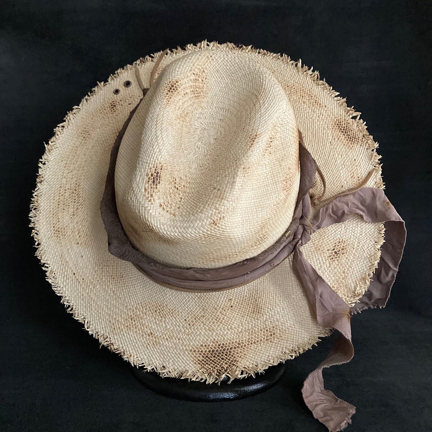 Burnt kind western hat