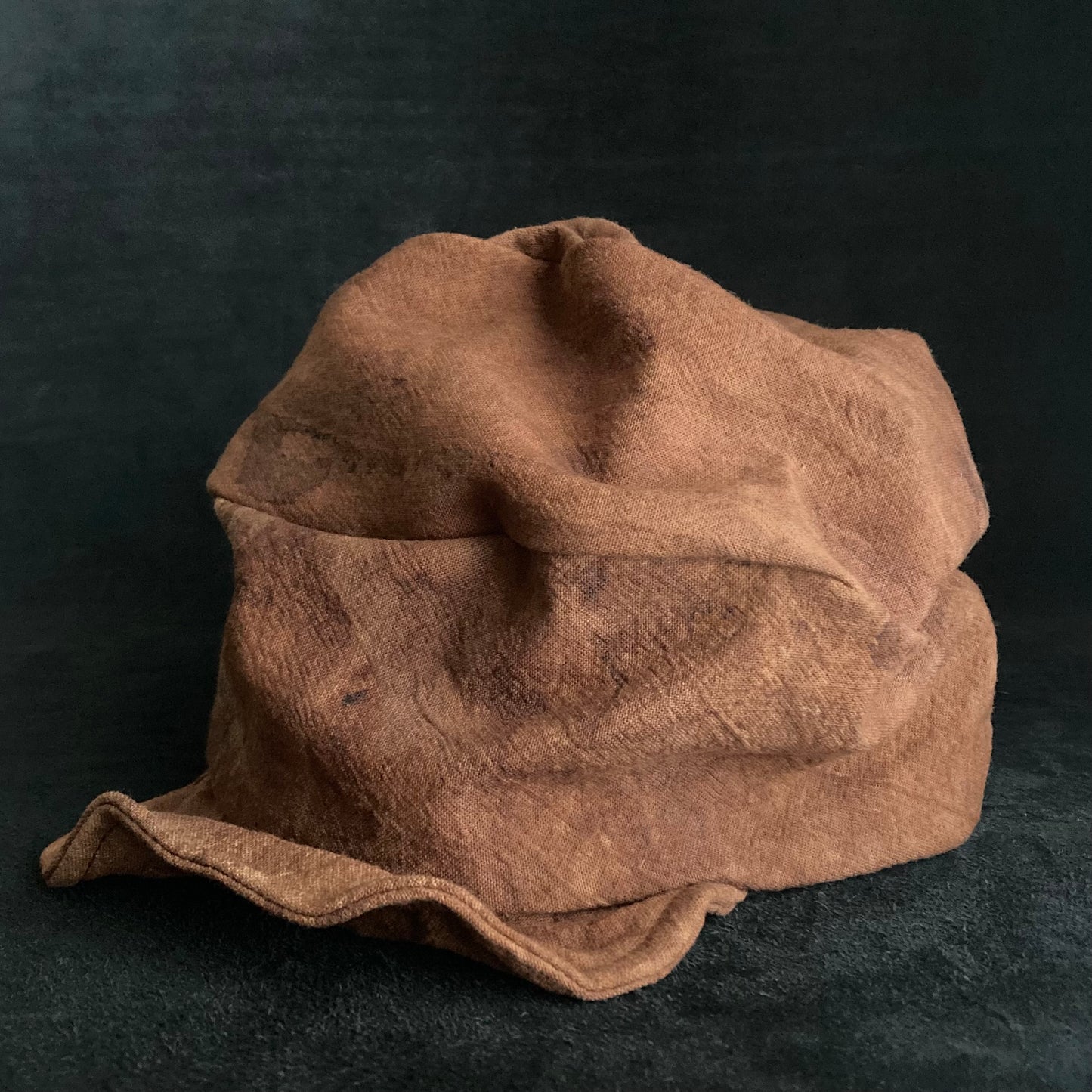 Mud dyed persimmon tannin turn cap