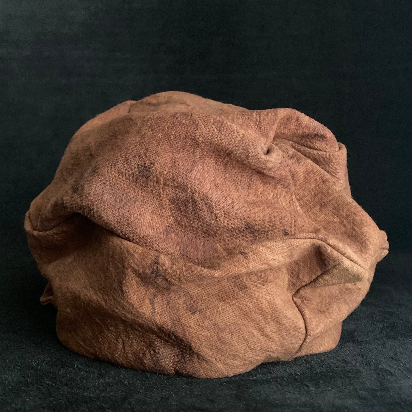 Mud dyed persimmon tannin turn cap