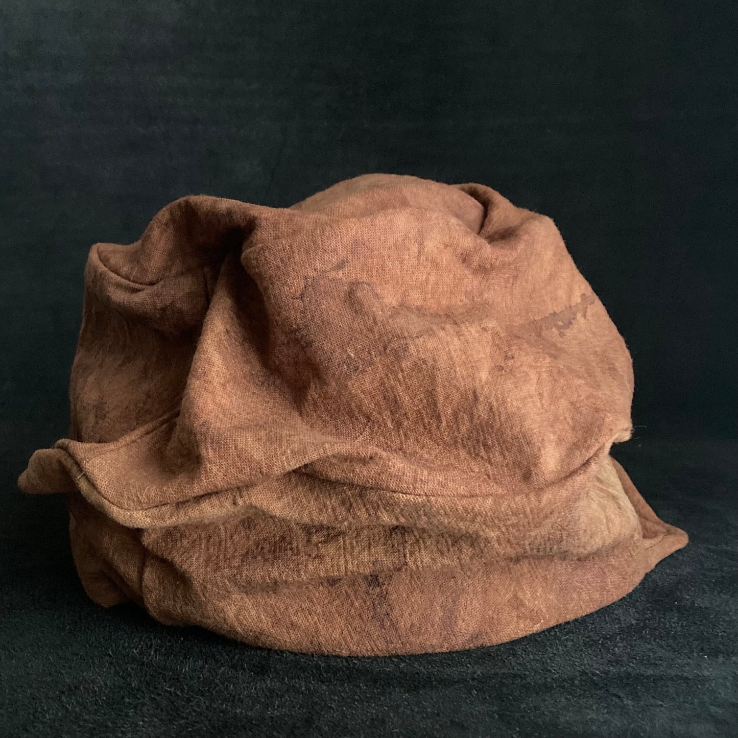 Mud dyed persimmon tannin turn cap