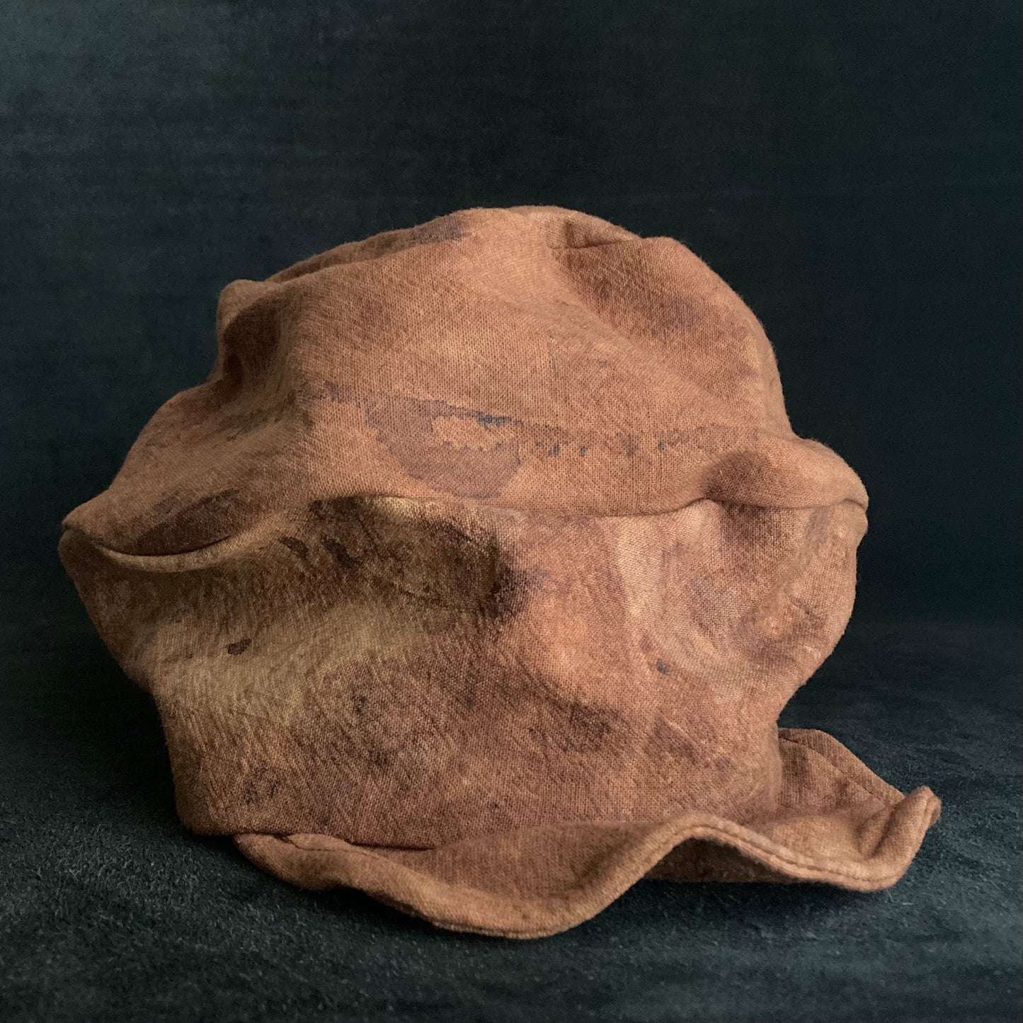 Mud dyed persimmon tannin turn cap