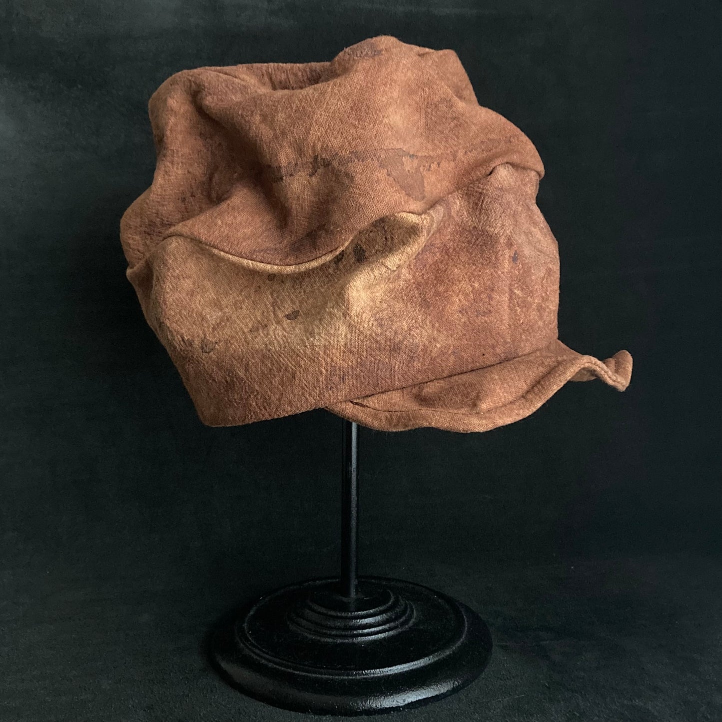 Mud dyed persimmon tannin turn cap