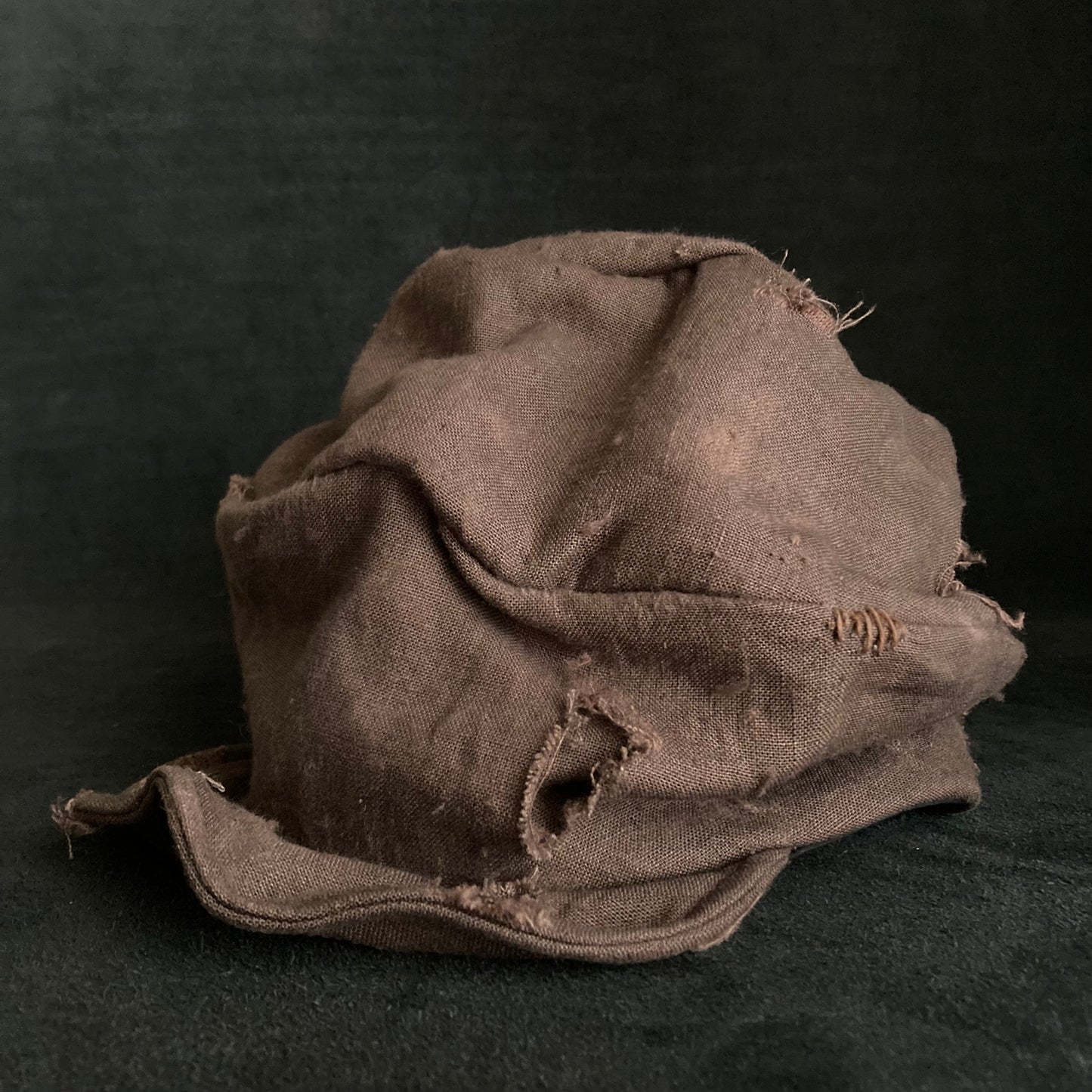 Brown linen damage turn cap