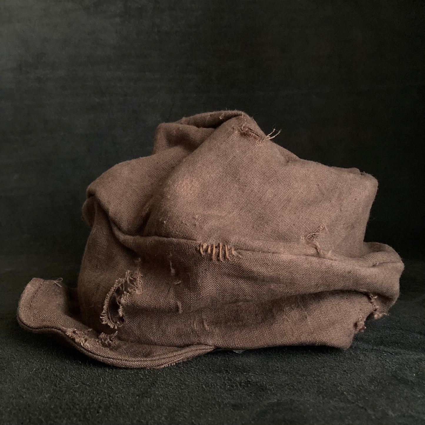 Brown linen damage turn cap