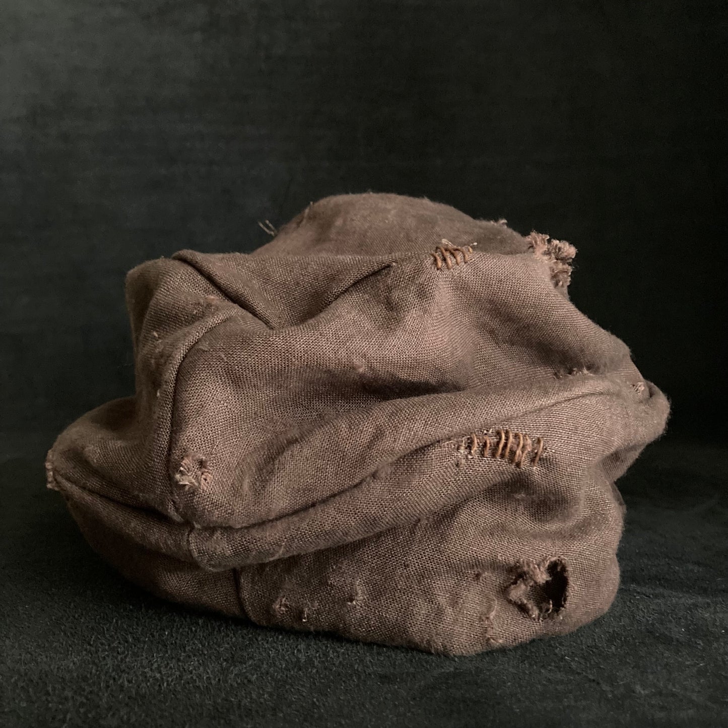 Brown linen damage turn cap