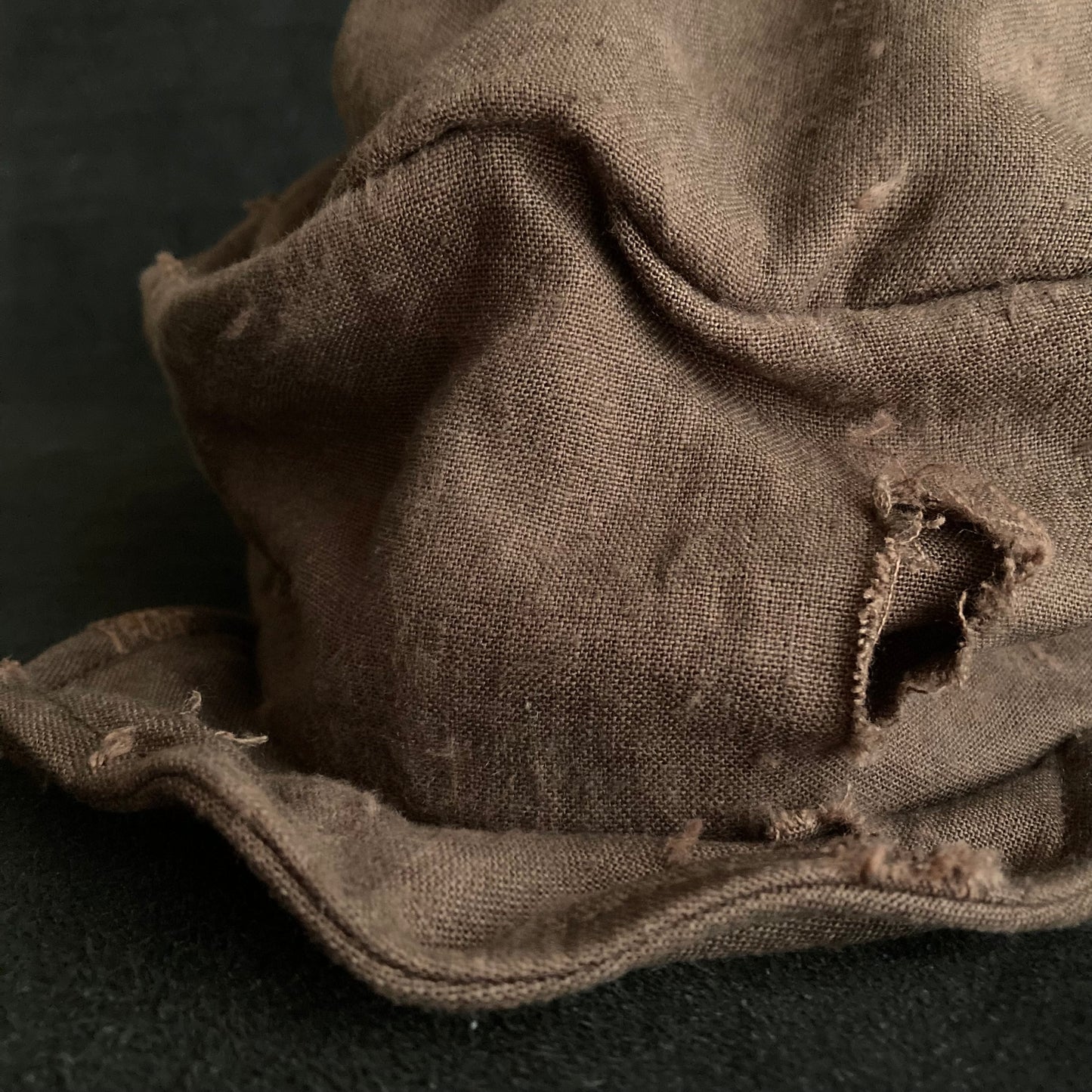 Brown linen damage turn cap