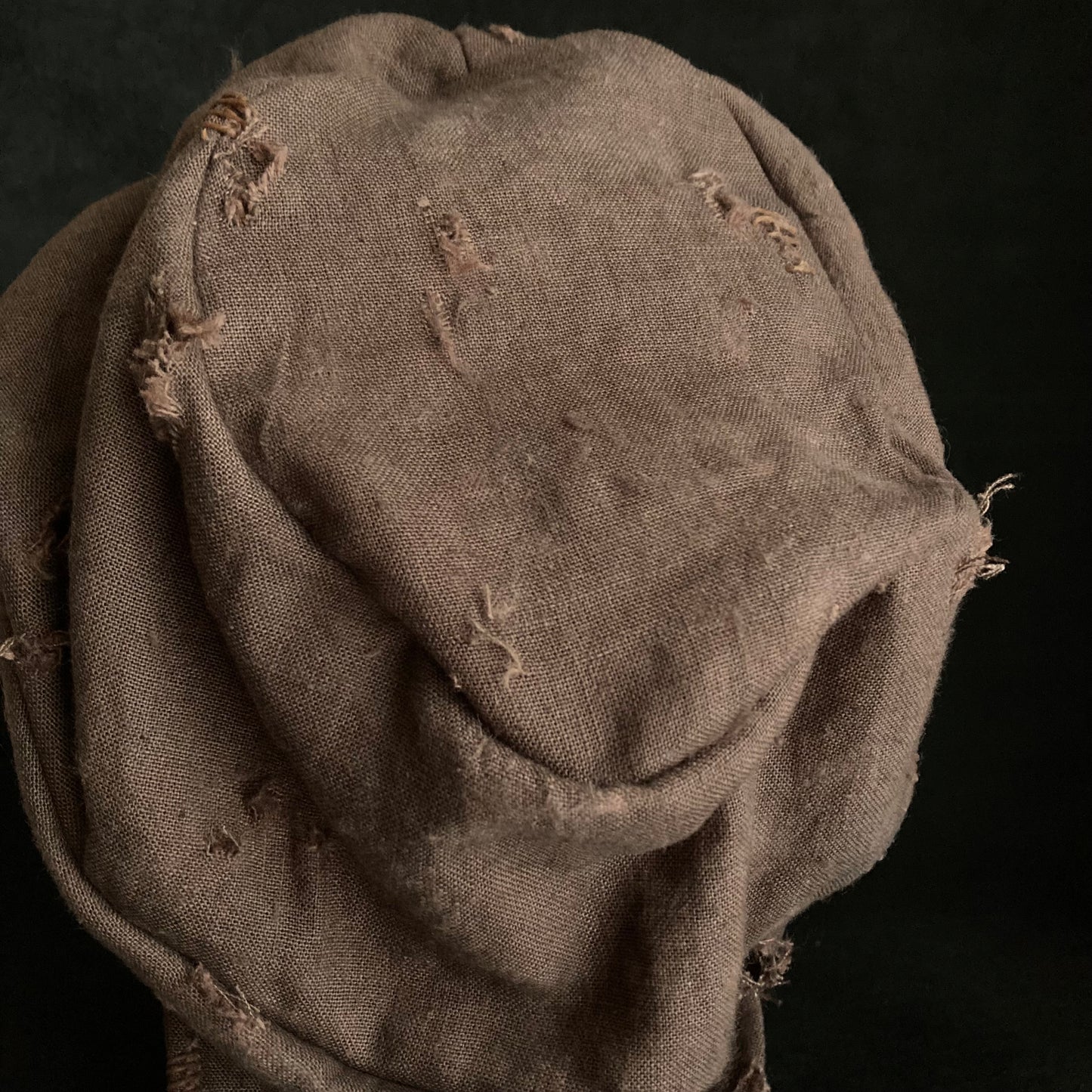 Brown linen damage turn cap