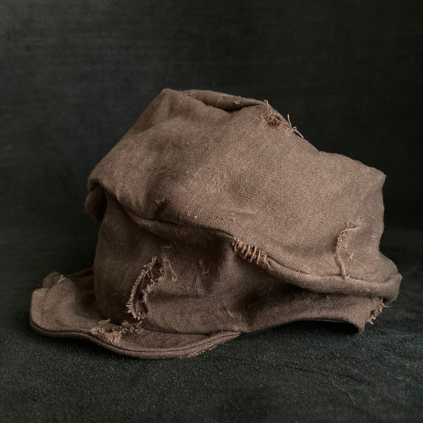 Brown linen damage turn cap